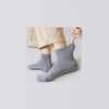 A pair of pure cotton mid-calf grey socks for both men and women Specification image